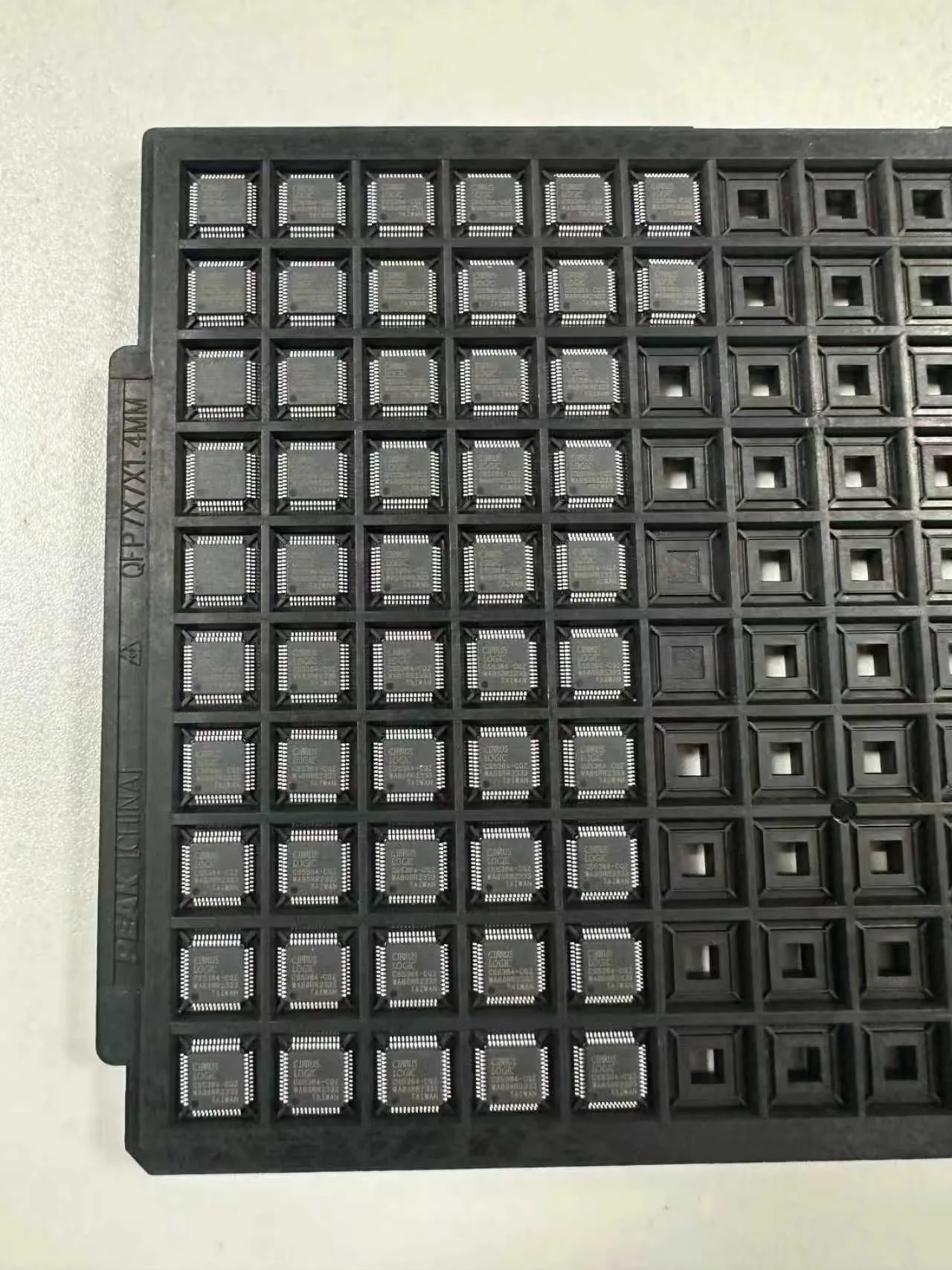 QFP-packaged Cirrus Logic ICs neatly arranged in an anti-static JEDEC tray, hard-to-find components sourced from Shenzhen