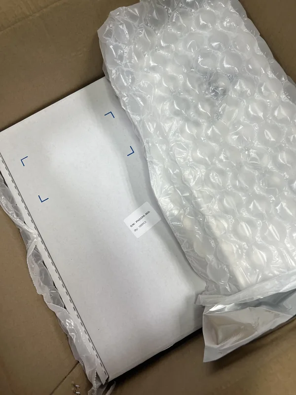 Bubble wrap and packed materials inside a carton.