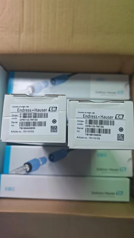 Boxed Endress+Hauser products with identification labels.