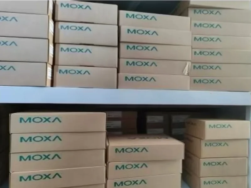 MOXA-branded product cartons on shelves.